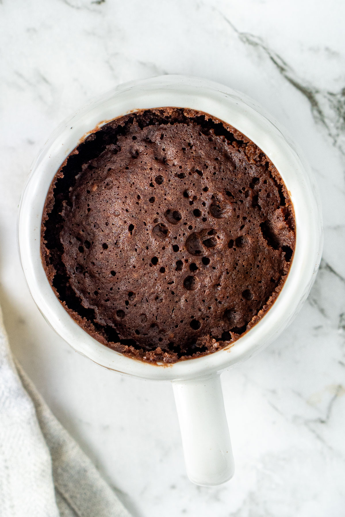 The cooked chocolate mug cake.