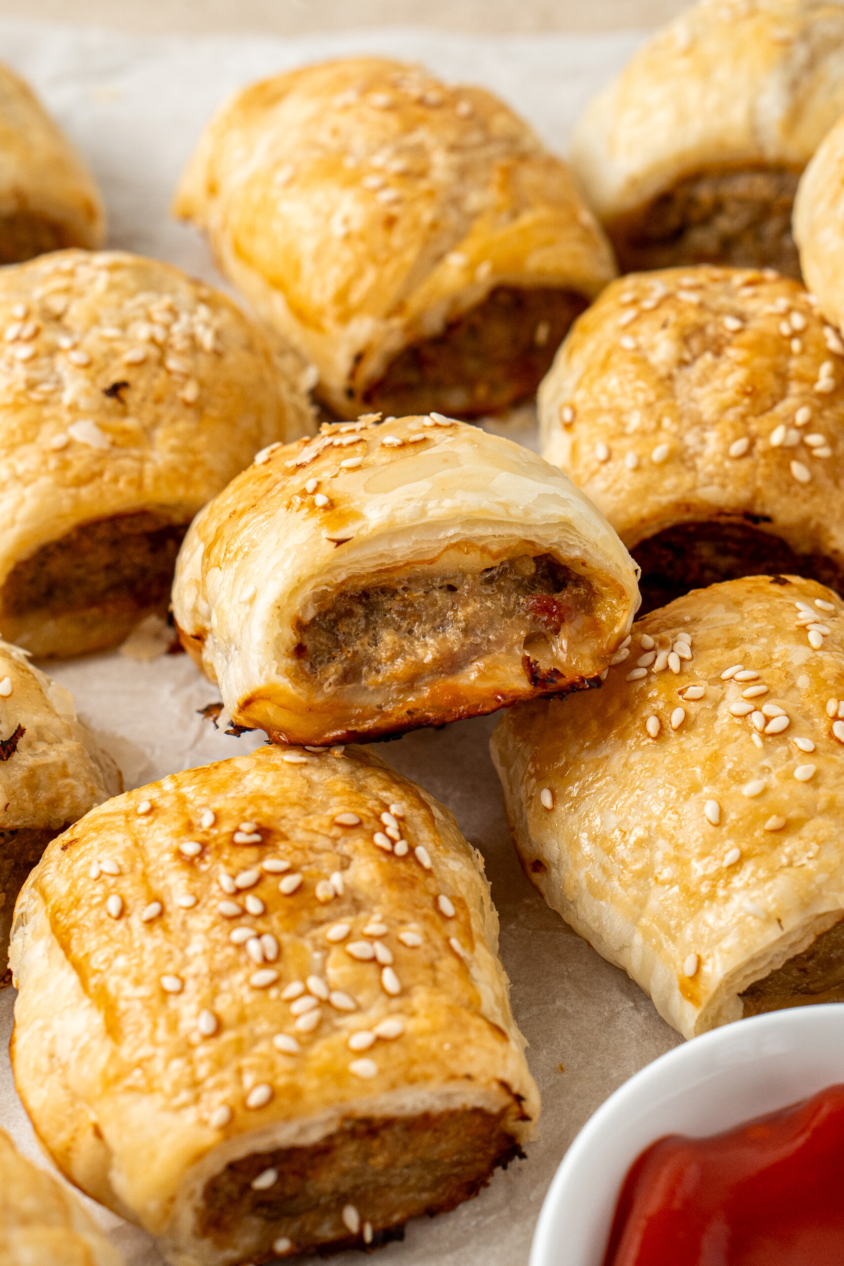Freshly baked pork and apple sausage rolls.