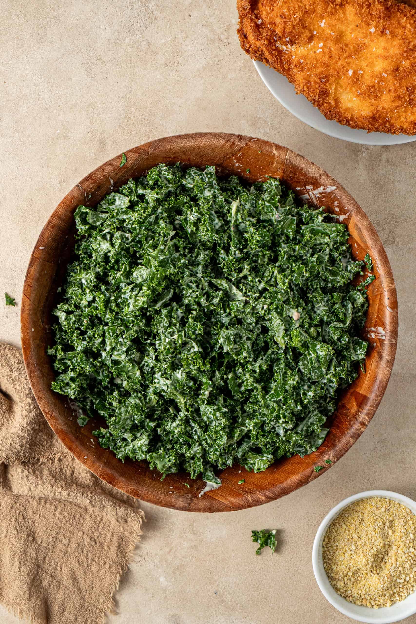 The dressing mixed in with the chopped kale.