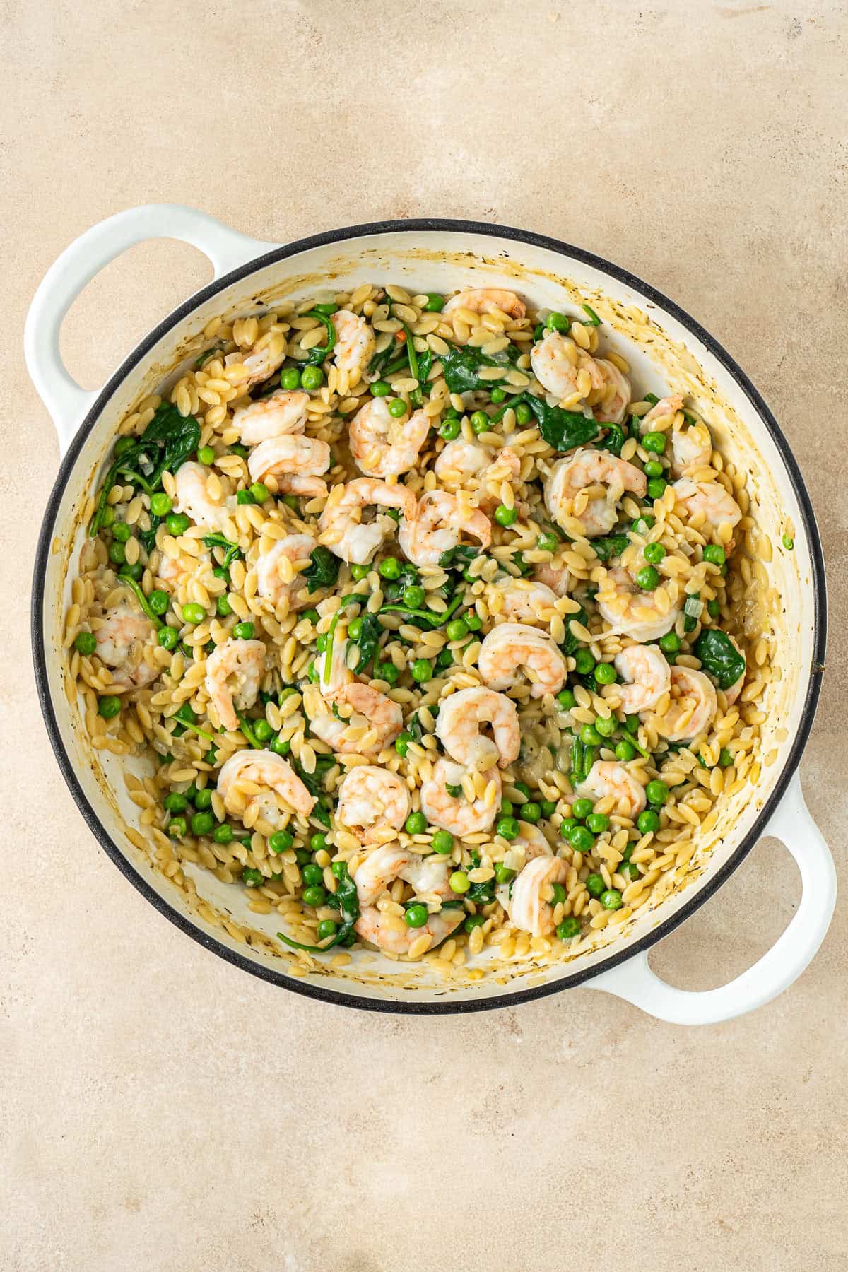The spinach and lemon mixed through the orzo with prawns.