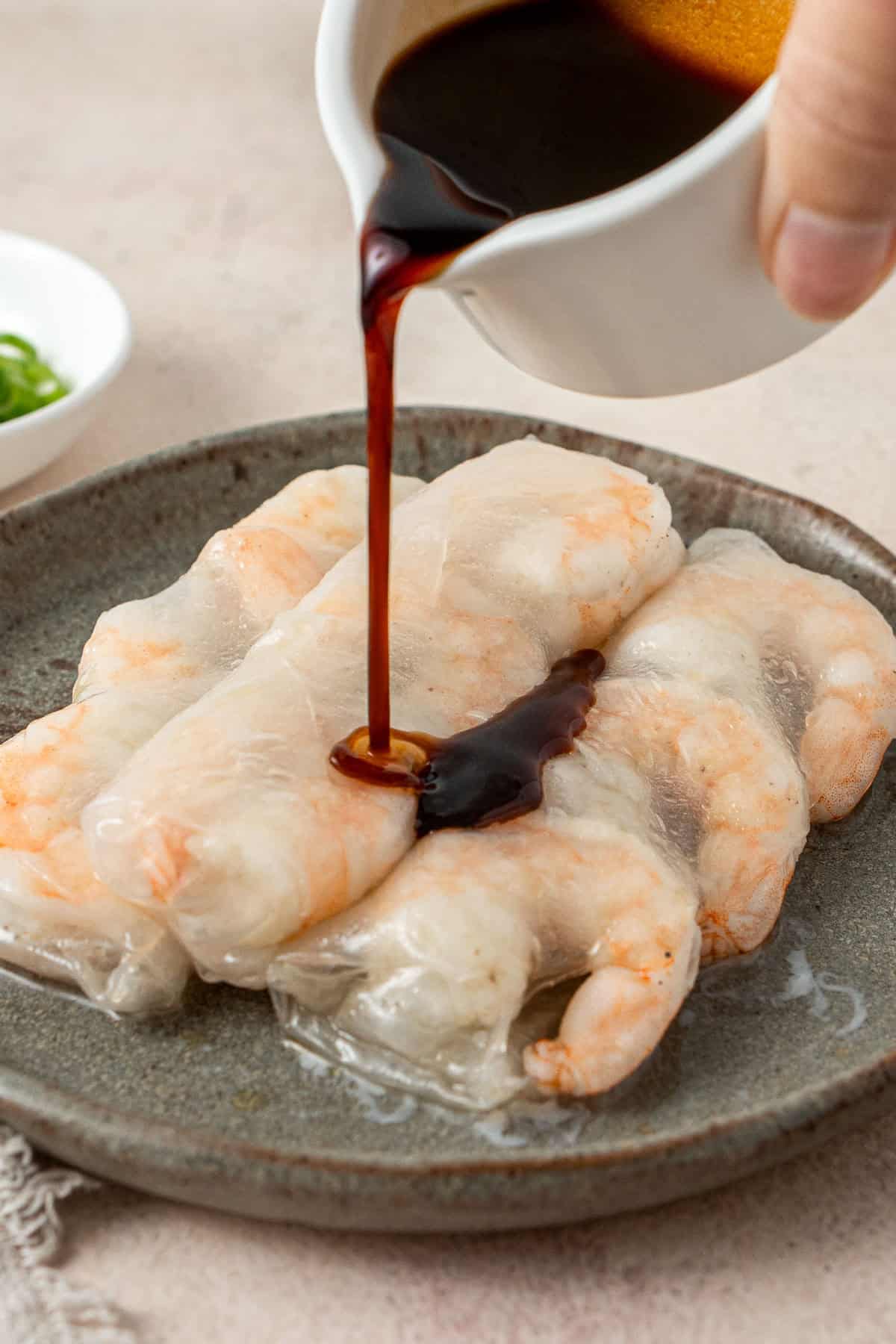 Pouring over the dipping sauce.