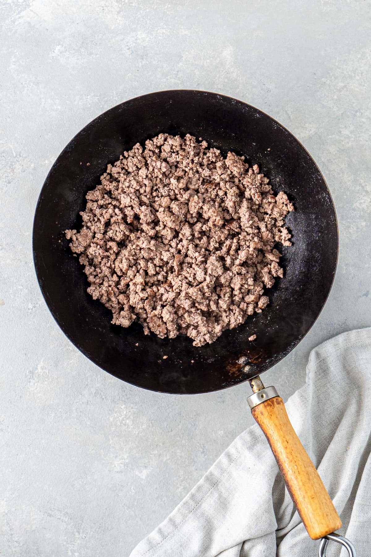 The mince browned in a wok.