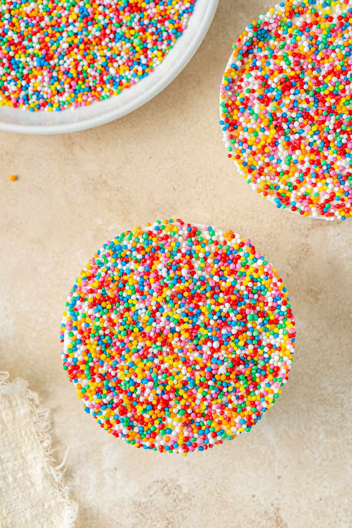 The dot cakes covered in sprinkles.