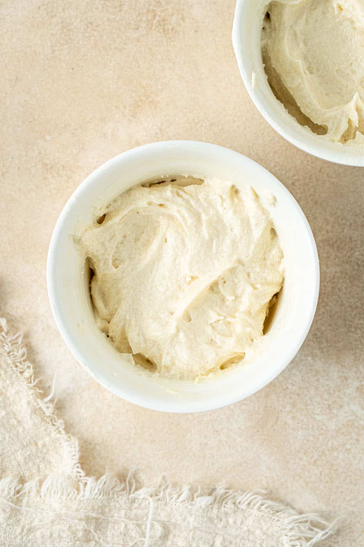 The cake batter in ramekins. 