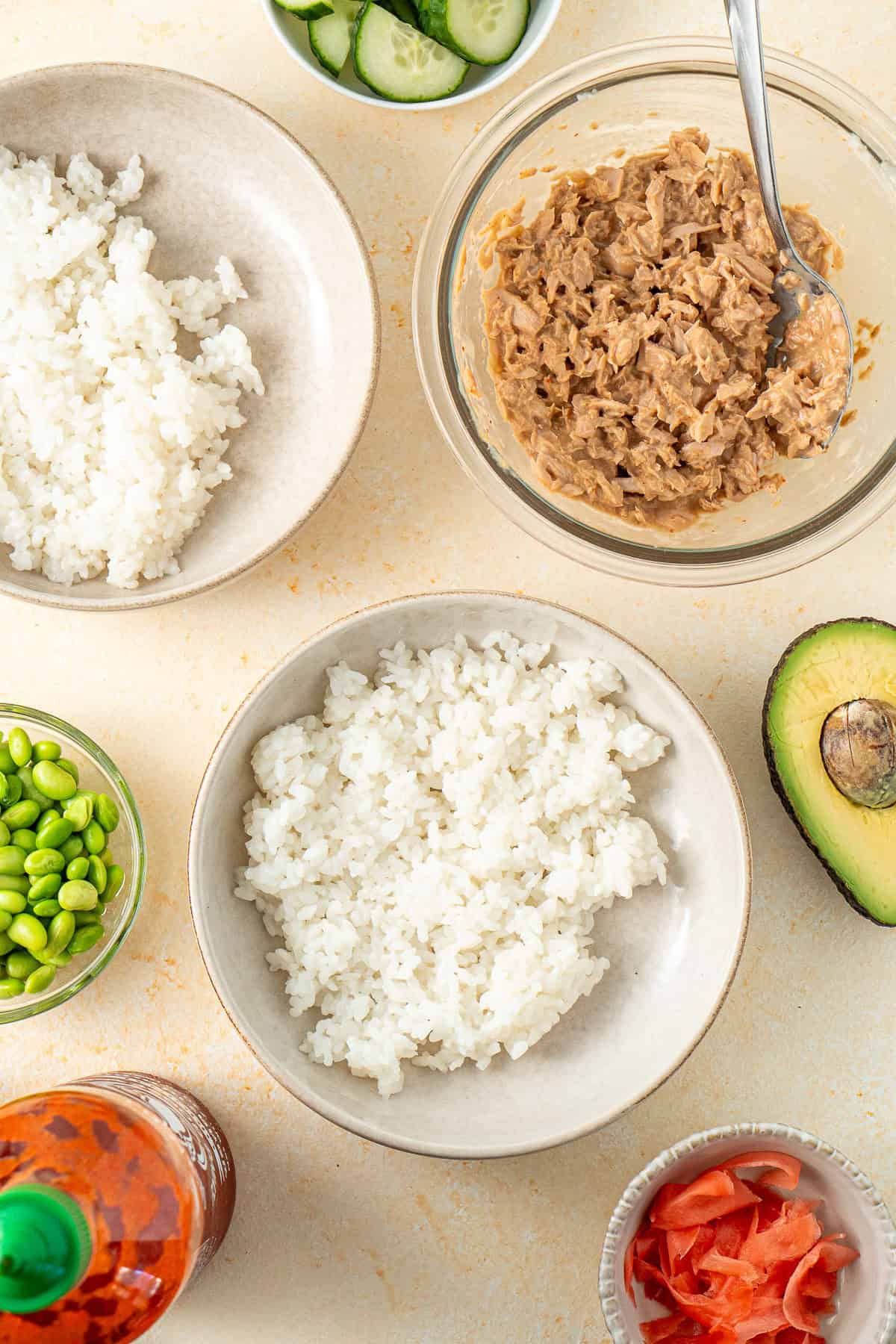 The cooked rice divided between bowls.