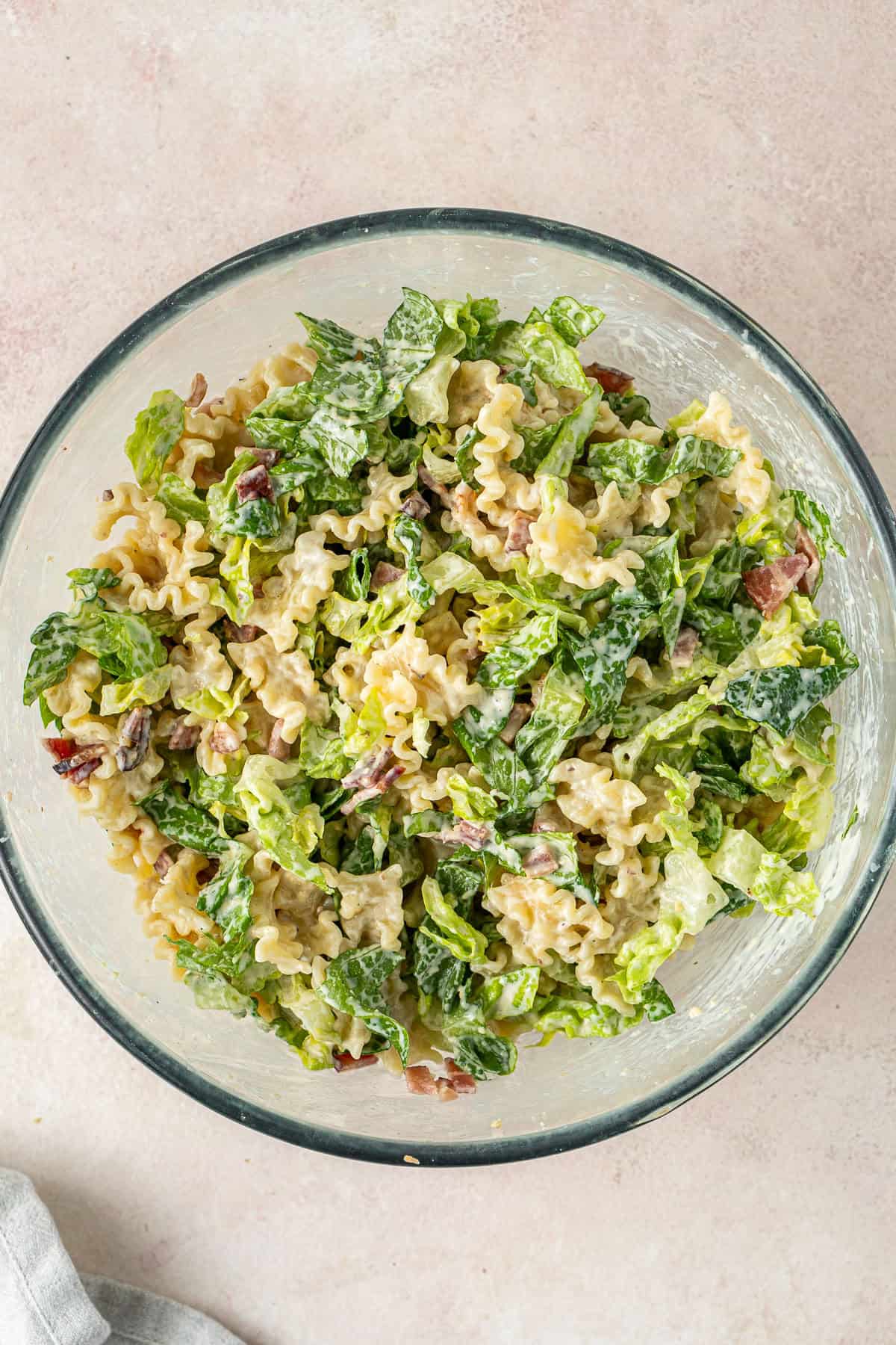 The salad tossed with the dressing.