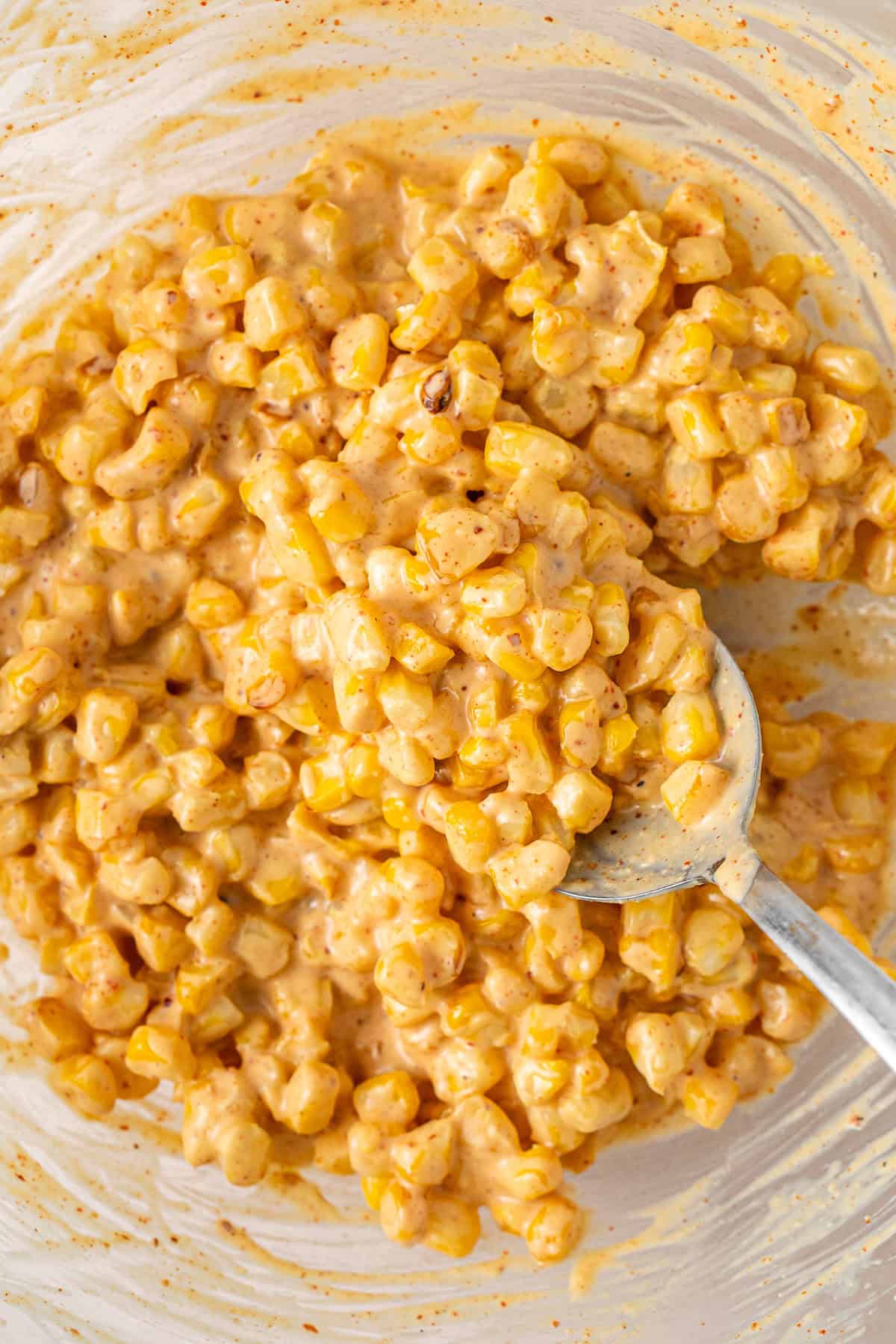 The mixed street corn in a bowl.