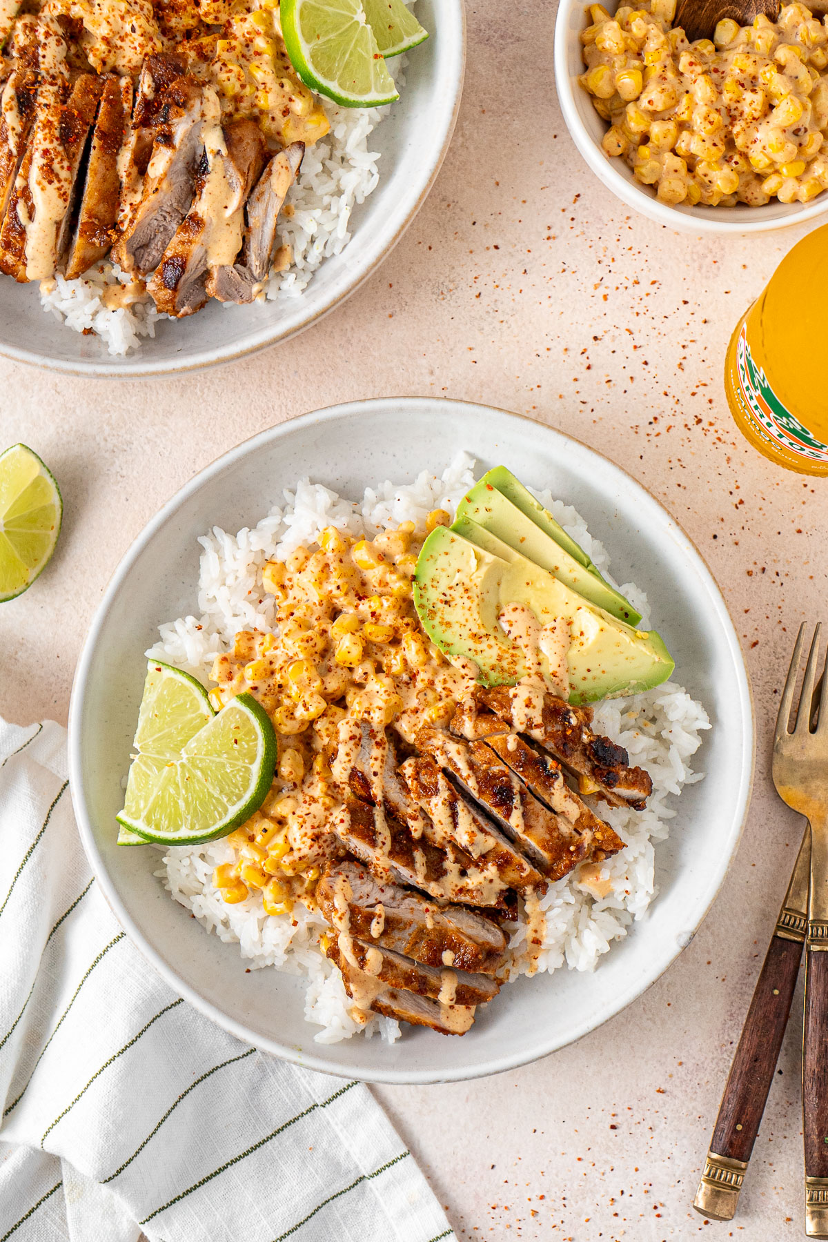 Street corn chicken rice bowls with avocado.