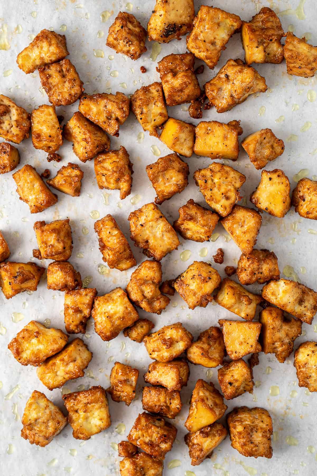 The golden cooked pieces of tofu.