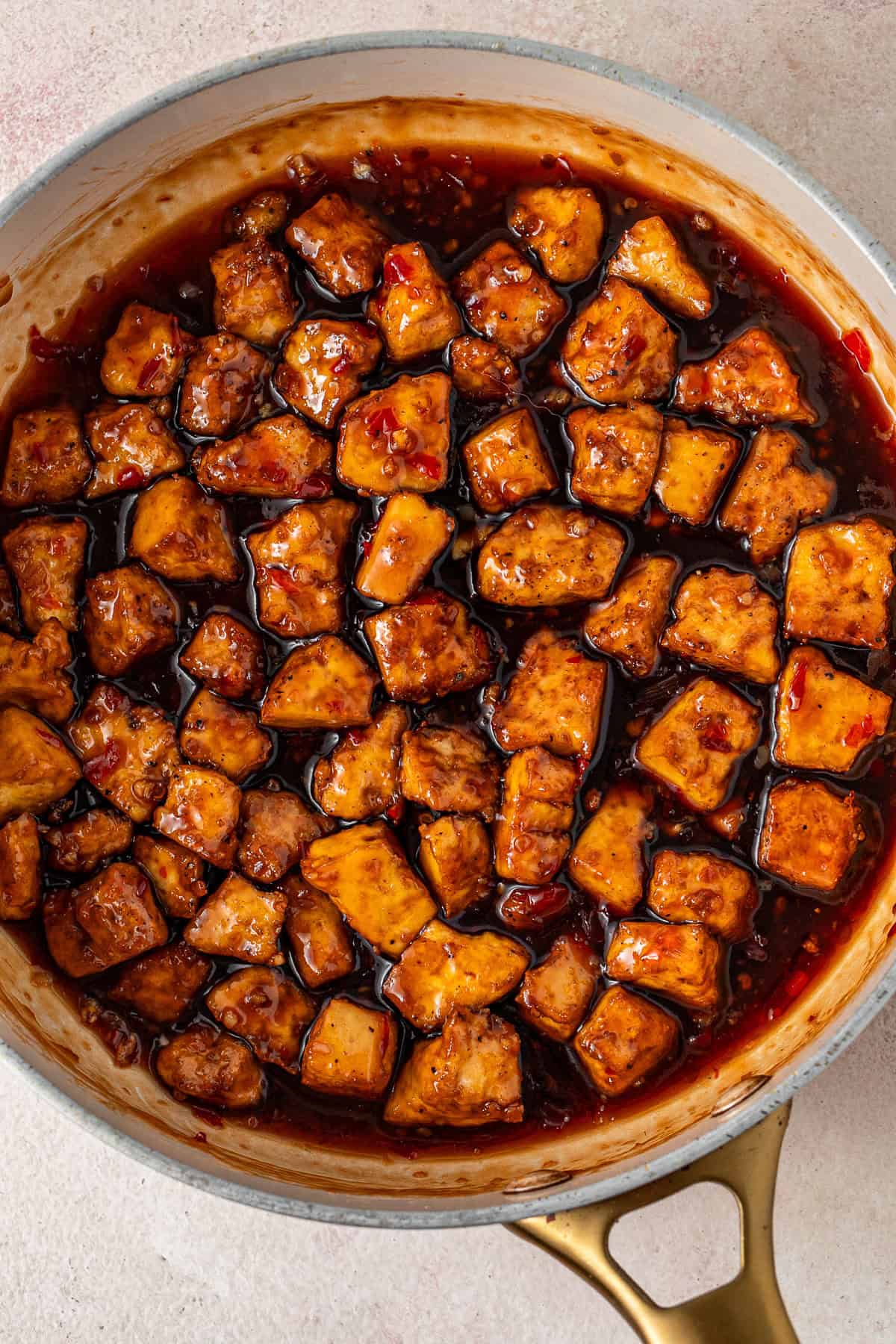 The baked tofu mixed through the sauce.